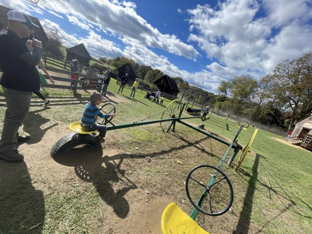 kids playing on seesaw